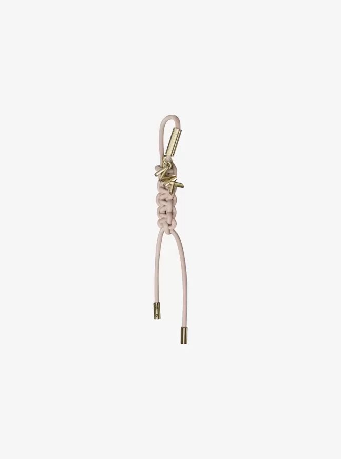 Goldfarbener Taschenanhänger aus geflochtener Kordel Goldfarbener Taschenanhänger aus geflochtener Kordel
