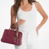 Goldfarbener und metallisch schimmernder Taschenanhänger aus geflochtener Kordel Goldfarbener und metallisch schimmernder Taschenanhänger aus geflochtener Kordel