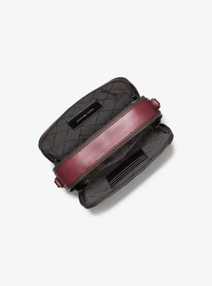 Hudson Logo geprägte, polierte Leder-Umhängetasche Hudson Logo geprägte, polierte Leder-Umhängetasche