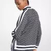 Jacke aus metallisch schimmerndem Stretch-Strick mit Logoprint und halbem Reißverschluss
