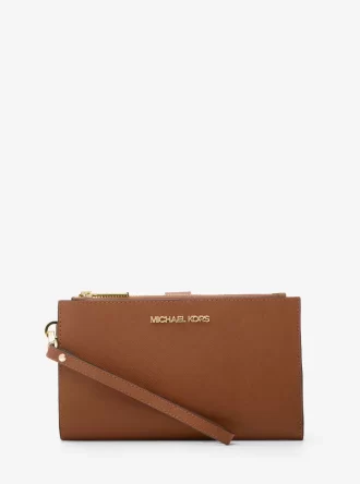 Jet Set Große Smartphone-Handgelenktasche aus Leder Jet Set Große Smartphone-Handgelenktasche aus Leder