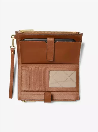 Jet Set Große Smartphone-Handgelenktasche aus Leder Jet Set Große Smartphone-Handgelenktasche aus Leder