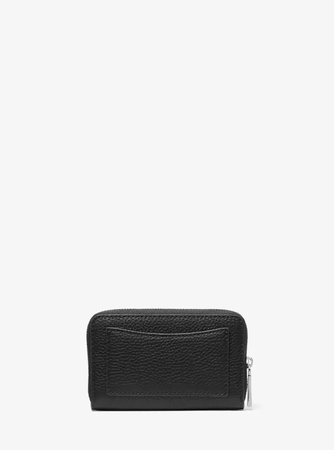 Jet Set Kleine Geldbörse aus genarbtem Leder mit Nieten Jet Set Kleine Geldbörse aus genarbtem Leder mit Nieten
