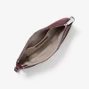 Jet Set Medium genarbtes Leder, wandelbare Handgelenktasche Jet Set Medium genarbtes Leder, wandelbare Handgelenktasche