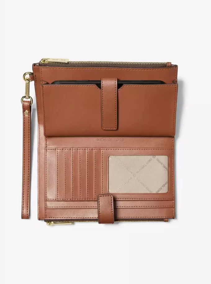 Jet Set Travel Smartphone-Geldbörse mit charakteristischem Logo Jet Set Travel Smartphone-Geldbörse mit charakteristischem Logo