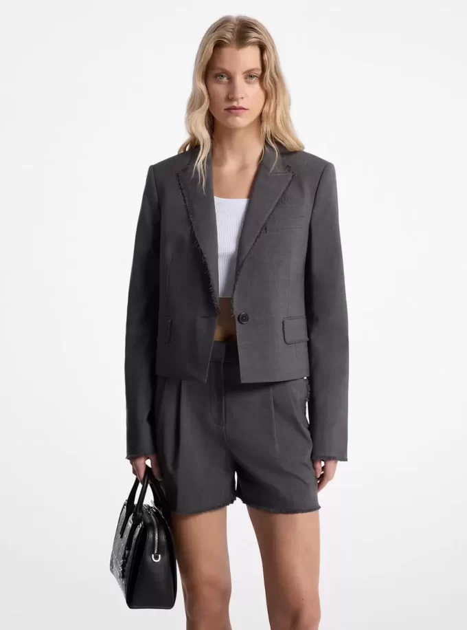 Kurzer Blazer aus Stretch-Tropenwolle mit Fransen Kurzer Blazer aus Stretch-Tropenwolle mit Fransen