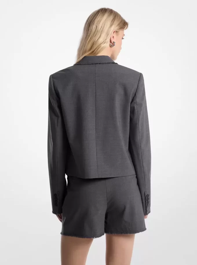 Kurzer Blazer aus Stretch-Tropenwolle mit Fransen Kurzer Blazer aus Stretch-Tropenwolle mit Fransen