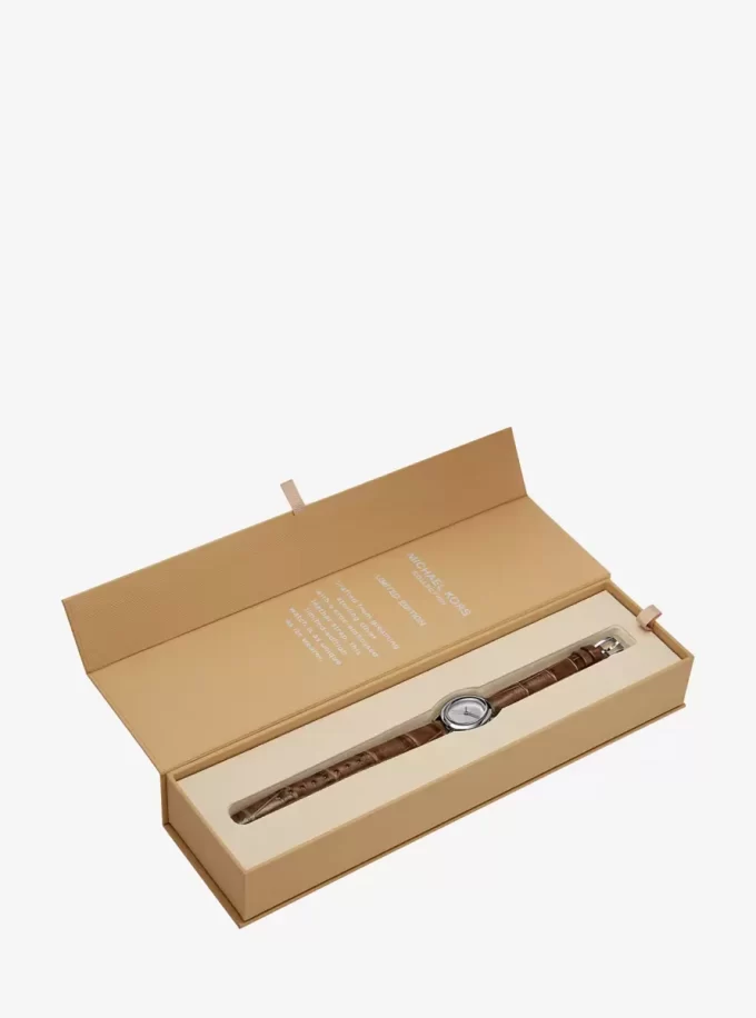 Limitierte Petite Maude Uhr in Silberoptik und mit Krokodilprägung Limitierte Petite Maude Uhr in Silberoptik und mit Krokodilprägung