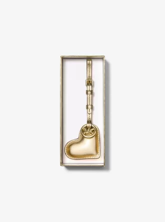 Metallener, herzförmiger Taschenanhänger aus Leder Metallener, herzförmiger Taschenanhänger aus Leder