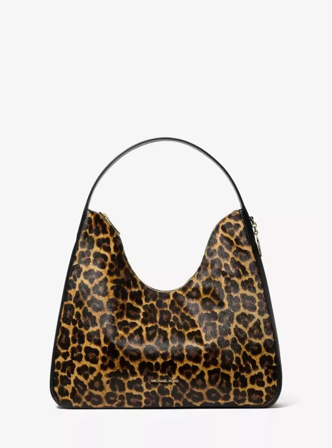 Nayla Schultertasche aus mittelgroßem Kalbsfell mit Leopardenmuster Nayla Schultertasche aus mittelgroßem Kalbsfell mit Leopardenmuster