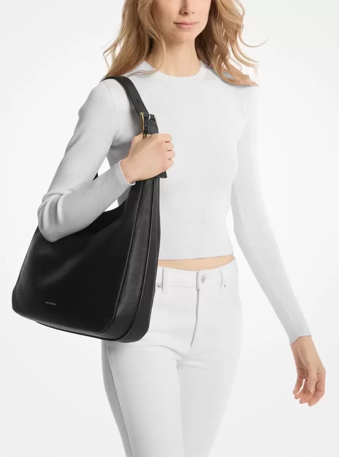 Nolita Große Hobo-Schultertasche aus genarbtem Leder Nolita Große Hobo-Schultertasche aus genarbtem Leder