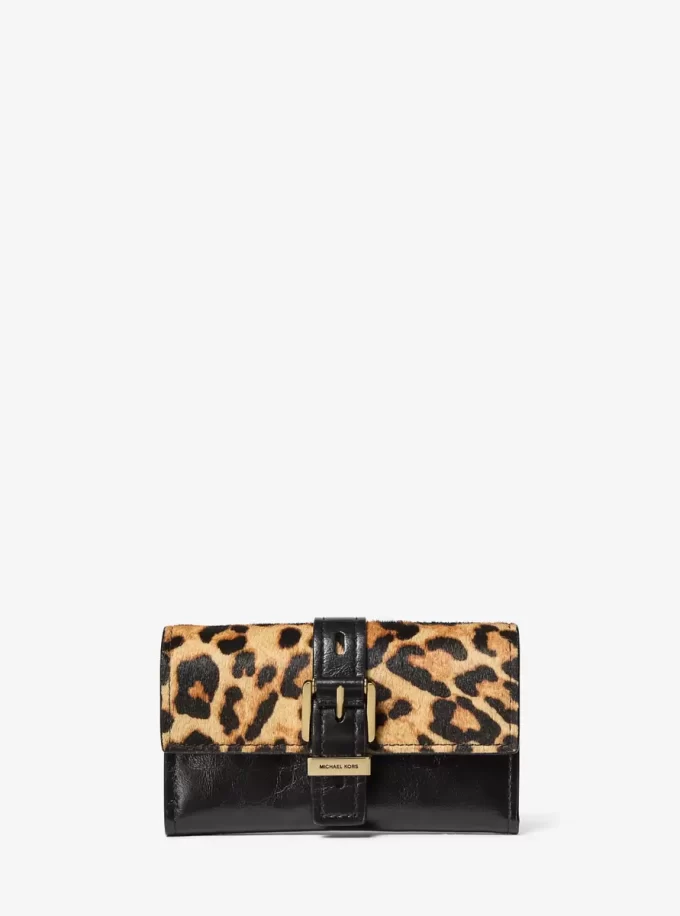 Nolita Mittlere Geldbörse mit Leopardenmuster aus Kalbsfell und Leder, dreifach faltbar Nolita Mittlere Geldbörse mit Leopardenmuster aus Kalbsfell und Leder, dreifach faltbar