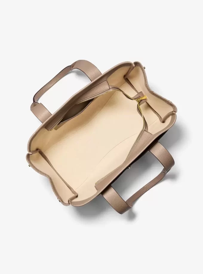 Romee Große Tragetasche aus Leder mit charakteristischem Logo Romee Große Tragetasche aus Leder mit charakteristischem Logo