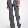 Trainingshose mit Logoprint, metallisch schimmerndem Stretch-Strick