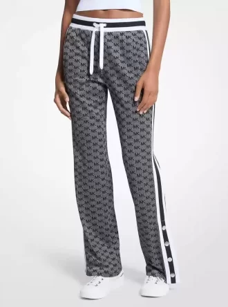 Trainingshose mit Logoprint, metallisch schimmerndem Stretch-Strick